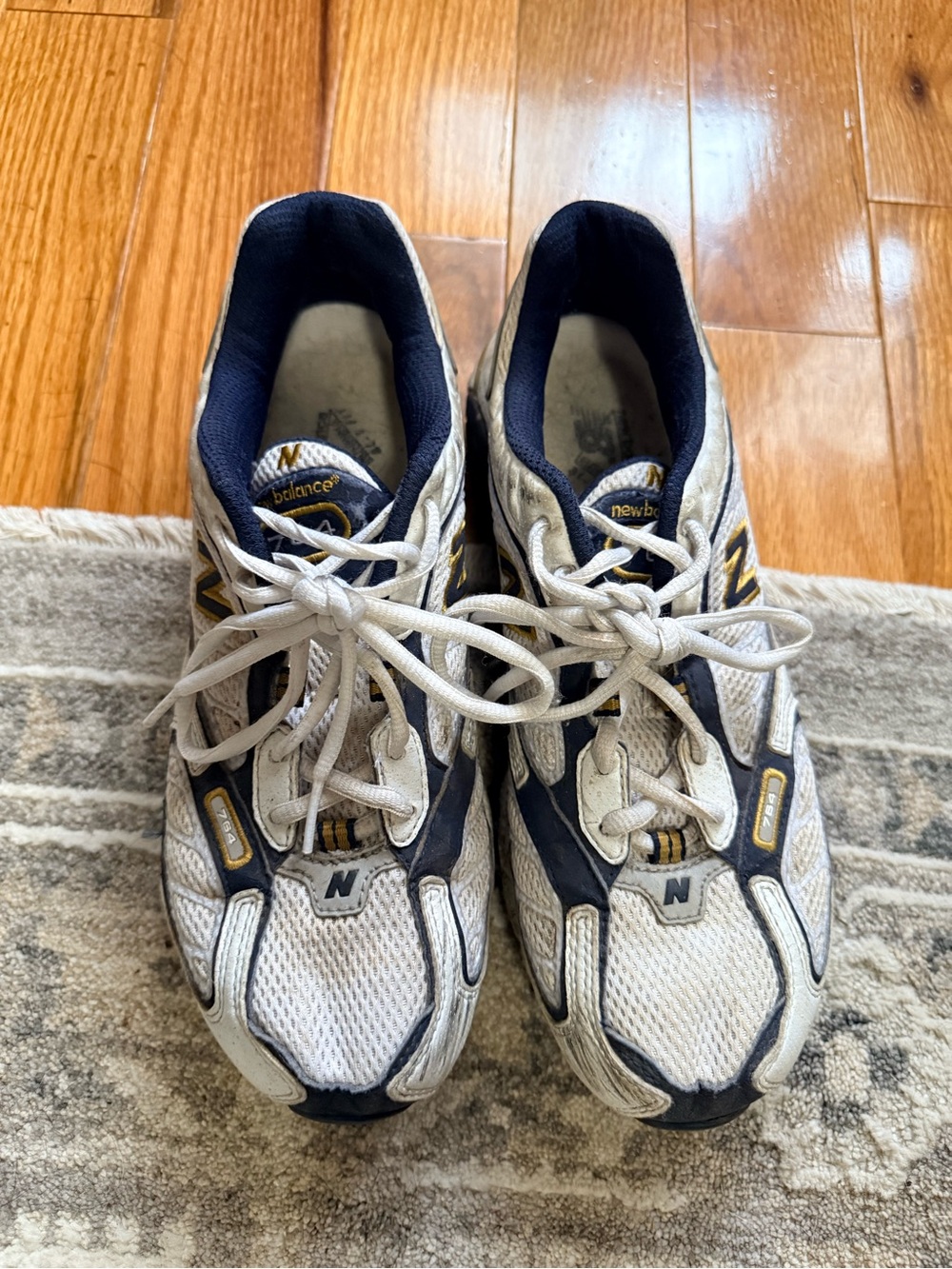 New Balance 764 White and Navy Athletic Running Shoes with Gold Accents